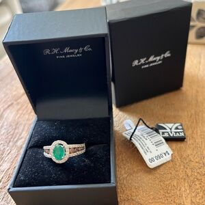 Levian, 14 karat white gold emerald and chocolate diamond and white diamond ring